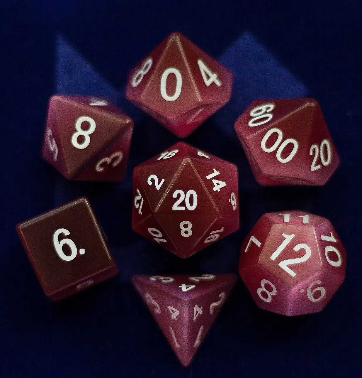 MDG 16mm Stone: Catseye Pink Stone Poly 7 Dice Set | Dragon's Lair Comics and Fantasy Houston TX