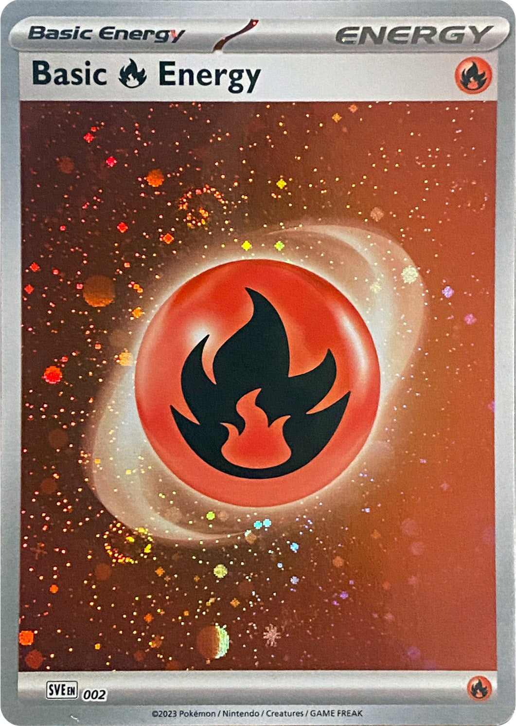 Basic Fire Energy (002) (Cosmos Holo) [Scarlet & Violet: Base Set] | Dragon's Lair Comics and Fantasy Houston TX