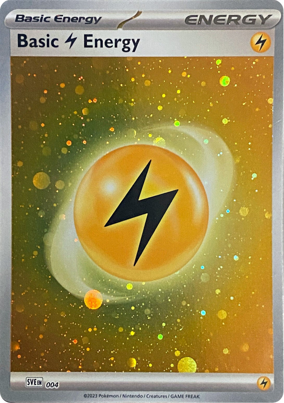 Basic Lightning Energy (004) (Cosmos Holo) [Scarlet & Violet: Base Set] | Dragon's Lair Comics and Fantasy Houston TX