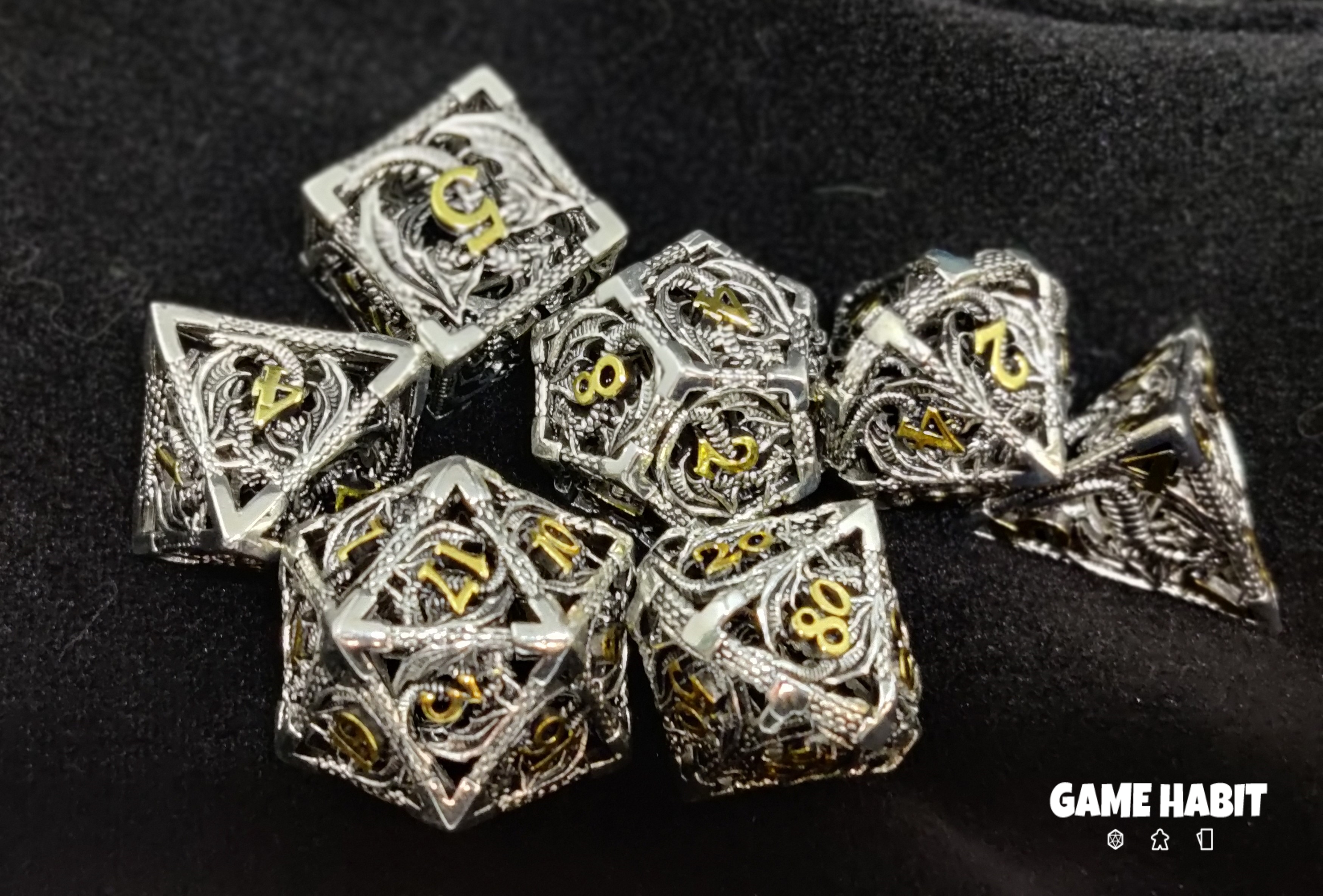 Game Habit Sterling Braids Hollow Metal Dragon Poly 7 Dice Set | Dragon's Lair Comics and Fantasy Houston TX