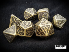 Game Habit Golden Compass Poly 7 Dice Set | Dragon's Lair Comics and Fantasy Houston TX