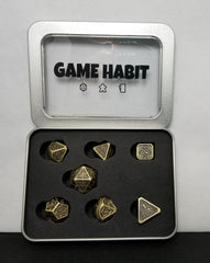 Game Habit Golden Compass Poly 7 Dice Set | Dragon's Lair Comics and Fantasy Houston TX