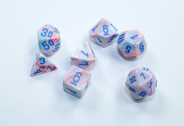 Chessex Mini Poly 7 Dice Set: Festive Pop Art and Blue | Dragon's Lair Comics and Fantasy Houston TX