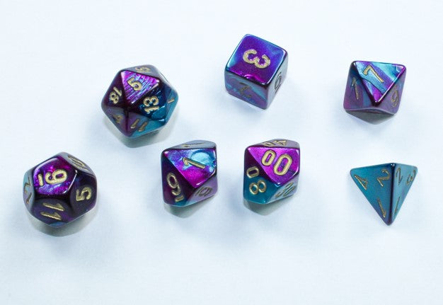 Chessex Mini Poly 7 Dice Set: Purple with Teal and Gold | Dragon's Lair Comics and Fantasy Houston TX