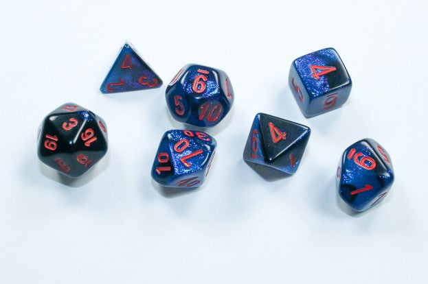 Chessex Mini Poly 7 Dice Set: Black Starlight with Red | Dragon's Lair Comics and Fantasy Houston TX