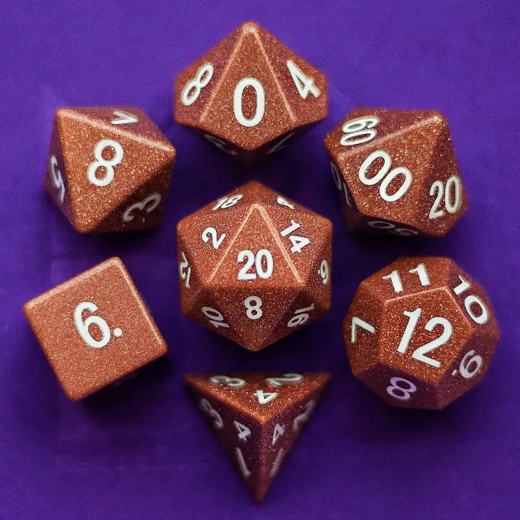 MDG 16mm Stone: Goldstone Poly 7 Dice Set | Dragon's Lair Comics and Fantasy Houston TX